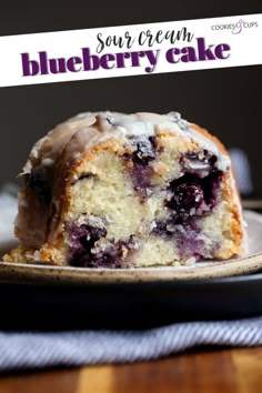 a piece of blueberry cake on a plate