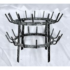 there is a metal object that looks like it's made out of sticks