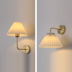 two wall lights that are next to each other on a white wall and one has a lamp shade over it