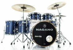 a blue and black drum set on a white background