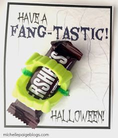 a halloween card with a candy bar on it and the words have a fang - tastic