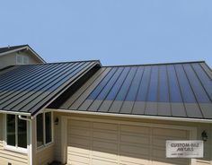 a house with solar panels on the roof