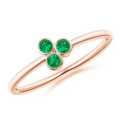 Sculpted in 14k rose gold, this classic round emerald ring delights with its minimalistic design. The three lush green emeralds are bezel set for a unique look. This emerald trio cluster ring is a quintessential example of timeless elegance. Round Emerald Ring, Rose Gold Stackable Rings, May Birthstone Rings, May Birthstone, Rings For Girls, Stackable Ring, Size 10 Rings, Natural Emerald, Emerald Ring