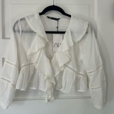 Size Xs. New With Tags. Small Spot Of Makeup As Noted In Photos. Can Be Washed Out Doen Zara Anthro Cropped Ruffle Blouse For Day Out, Cropped Ruffled Blouse For Day Out, Elegant Cropped Blouse With Ruffles, Elegant Cropped Ruffle Blouse, Elegant Cropped Summer Blouse, White Ruffled Crop Top Blouse, Elegant Cropped Blouse For Summer, Spring Ruffled Crop Top Blouse, Elegant Cropped Zara Blouse