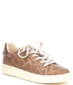 From COACH&#x2C; the Lowline C Logo Print Canvas Sneakers feature:C logo print coated canvas upperLace-up closureFine mesh liningRubber outsoleFlat heelImported. Coach Sneakers, C Logo, Print Coat, Dream Shoes, Coach Shoes, Canvas Sneakers, Dillard's, Golden Goose Sneaker, Casual Sneakers