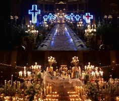 a church filled with lots of lit candles