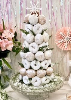 a cake made out of doughnuts sitting on top of a table