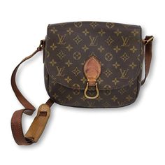 This Louis Vuitton Saint Cloud Shoulder Bag is composed of monogram canvas with leather trim and strap. It has one flat exterior pocket and it's flap opens 1 one large compartment with a small interior zipped pocket. Color: Brown Material: Monogram Canvas & Leather Made in: France Size: 35 cm x 30 cm x 14 cm Date Code: no date code, has worn off Condition: USED, ok condition. Dark uneven patina leather. Slight Vintage smell. Some cracking on the edges of the canvas. Internal date code has faded Designer Shoulder Bag With Gold-tone Logo Plaque, Brown Leather Shoulder Bag With Monogram Print, Brown Crossbody Shoulder Bag With Gold-tone Logo, Distressed Brown Waxed Finish Shoulder Bag, Louis Vuitton Flower Mm Monogram Canvas & Cowhide Leather Zipped Tote Noir, Pre Owned Louis Vuitton, Canvas Leather, Shoe Box, Monogram Canvas