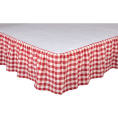 a red and white checkered bed skirt