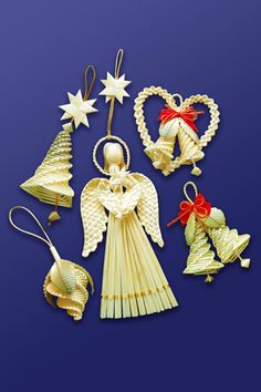 an assortment of christmas ornaments on a blue background