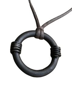 PRICES MAY VARY. medieval iron torc beeswax, leather.. It begins life as a section of 20mm round..... A hole is punched in the centre and it is then drifted and forged until the hole is the same diameter as the starting stock and the ring is roughly twice it’s original size. Due to the nature of handmade items, no two will ever be the same, making this a really unique piece for a gift or for yourself. A hand forged iron ring pendant, made by myself here at the forge These pendants will all sligh Forged Jewelry, Iron Jewelry, Geometric Pendant Necklace, Iron Pendant, The Forge, Iron Ring, Viking Ring, Witch Jewelry, Hand Forged Iron