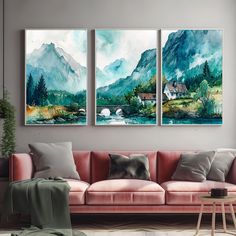 a living room with two paintings on the wall