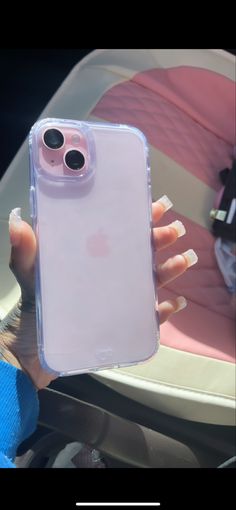 a person holding an iphone case in their hand