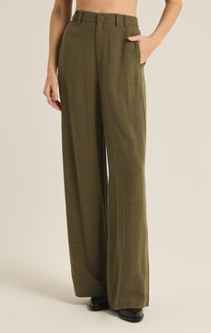 Elevate your casual look with this chic linen pant. Dressed up or down, this full length pant features side seam pockets, a wide hem and belt loops for comfort and easy styling. Regular fit Rayon Linen: 86% Rayon, 14% Linen High rise Full length Zip front Side seam pocket Midweight Heavy soft wash Machine Wash Cold, Gentle Cycle, Hang to Dry Kimono Outerwear, Linen Pant, Grape Leaf, Linen Romper, Strapless Tops, Linen Shop, Loungewear Sets, Top Graphic Tees, Long Blouse