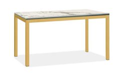 a marble top dining table with gold legs and an off - white base, viewed from the front