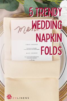 a table setting with napkins, flowers and place settings for the 5 trendy wedding napkin folds