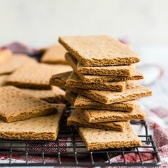 a pile of crackers sitting on top of a cooling rack