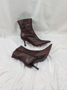 I present to your attention unique vintage brown stiletto heel dress boots with a tointed toe made of genuine leather. These women's 90s-style zip-up boots are comfortable and practical. The soft leather made these boots very comfortable. These vintage retro style ankle boots with a high heel are made for special women. Be the center of attention with confidence: these boots are guaranteed to turn heads and spark conversations. A classic style that never goes out of style, offering you an iconic Fitted High Heel Boots In Faux Leather, Fitted High Heel Faux Leather Boots, Faux Leather High Heeled Boots, Fitted High Ankle Faux Leather Boots, Fitted High Ankle Platform Boots With 4-inch Heel, Fitted Pointed Toe Heeled Boots For Fall, Fitted Fall Boots With Pointed Toe, Vintage Brown Boots For Party, Fitted Faux Leather Ankle Boots