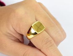 This listing is for 14k Gold Filled signet ring the base metal is 925 sterling silver. this is a timeless classic that goes with just about any look and will look great both on man and woman. What is Gold Fill? It's an actual layer of gold-pressure bonded to another metal. Gold filled is not to be confused with gold plating as filled literally has 100% more gold than gold plating. Gold filled is much more valuable and tarnish resistant. It does not flake off, rub off or turn colors. As a matter Shiny Finish Signet Ring As Gift, Gift Signet Ring With Shiny Finish, Gold Rings With Shiny Finish For Gift, Slytherin Ring, Onyx Signet Ring, Flat Ring, Ring Everyday, Signet Ring Men, Everyday Ring