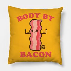 a yellow pillow with the words body by bacon printed on it and a cartoon character