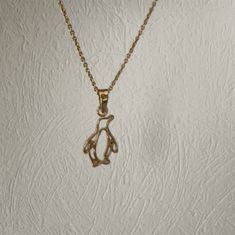 Penguins can't fly. I can't fly. Therefore I am a penguin. Share the love of all things penguin with this dainty silhouette penguin necklace. ● Sterling silver with 24k gold plating ● Silver 18 inch rope chain with 24k Gold Plating ● Size: 11 x 11 mm ● Gift tin included Penguin Necklace, Penguin Jewelry, Sports Jewelry, Tin Gifts, Marching Band, Plate Size, Rope Chain, Gold Pendant Necklace, Gold Plated Silver