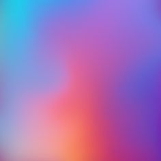 an abstract blurry background with blue, pink and orange colors in the middle is shown