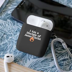 an apple airpods case with the words i am a disciples jesus christ on it