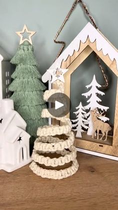 a christmas tree and other decorations on a shelf