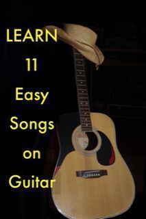 an acoustic guitar with the title learn 11 easy songs on guitar