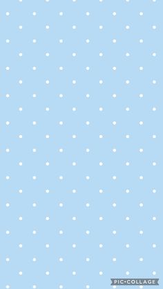 a blue background with white polka dots