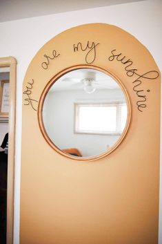 a mirror with writing on it that says, i love you my son and me