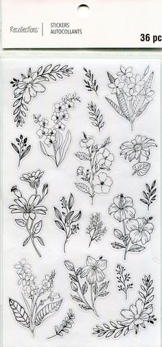 a sheet of clear stickers with flowers and leaves on the front, in black ink