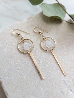 These beauties feature the beautiful Moonstone Gemstone. They are perfect earrings for any outfit and are super light! Moonstone is known to nourish and awaken your feminine energies. To sooth stress and bring about calmness. (Yes please! lol!) It is also a wonderful stone for new beginnings. Each piece is handmade from your choice of either Sterling Silver or 14K Gold Filled materials. The length is just about 2 in. Some of the Moonstone have a blue "flash" to them and others are more of a whit Gemstone Earring Ideas, Boho Wedding Earrings Brides, Handmade Moonstone Earrings As Gift, Handmade Moonstone Earrings For Gift, Handmade Moonstone Earrings, Dainty Moonstone Earrings For Everyday, White Moonstone Earrings For Daily Wear, Moonstone Earrings With Ear Wire For Gift, Everyday Round Moonstone Earrings