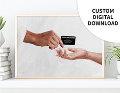 two hands are reaching out to each other with a credit card in front of them