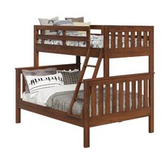 a wooden bunk bed sitting next to a white pillow on top of a bed frame