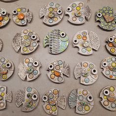 many different types of fish made out of clay