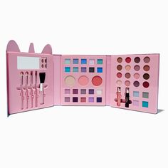 Decorated with a unicorn design, this makeup set has everything you need for your daily makeup routine, like eyeshadows, blushes, lip colors, and five different applicators. There's even a mirror inside for touchups throughout your day; just fold it up, tuck it into your bag, and go!6.5W x 7H x 1D in. (closed) / 16.51W x 17.78H x 2.54D cm. (closed)Materials: Powder/Cream - Claire's Ombre Unicorn 48 Piece Makeup Set Claire's Makeup, Unicorn Makeup Brushes Set, Unicorn Makeup Brushes, Sensitive Ears Earrings, Daily Makeup Routine, Flower Crown Hairstyle, Unicorn Makeup, Special Occasion Hairstyles, Hair Gift