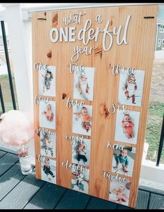 a wooden sign with pictures on it that says what a onederful year