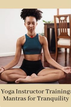 a woman sitting in the middle of a yoga pose