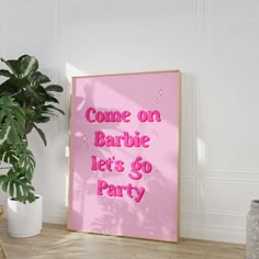 a pink poster that says come on barbie let's go party next to a potted plant