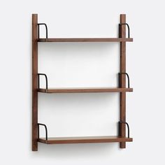 two wooden shelves with metal handles on each shelf