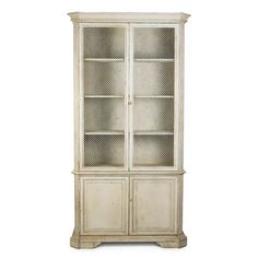 an old white china cabinet with glass doors on the front and bottom shelves, against a white background