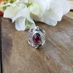 NOTE : WE USED NATURAL GEMSTONES , SO STONE  MAY BE LITTLE DIFFERENT .This  is a listing  of Boho sterling silver ring # metal = sterling silver  925 # Gemstone  - Garnet# Ring Size - Available in all Size # Stone Color - Purple# Stone Shape - OvalHandmade Crafting bohemian Ring - This style has bohemian style . it will look beautiful when you wear it ..Thanks for visiting our shop ...  favorite our shop for daily updates ... Bohemian Sterling Silver Filigree Ring For Anniversary, Bohemian Silver Oval Ruby Ring, Bohemian Rings For Anniversary, Bohemian Sterling Silver Ruby Ring, Bohemian Sterling Silver Amethyst Ring, Bohemian Sterling Silver Ruby Ring For Anniversary, Adjustable Silver Ruby Ring In Bohemian Style, Bohemian Sterling Silver Amethyst Ring With 925 Stamp, Bohemian Crystal Toe Ring For Anniversary