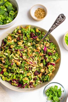 a salad with broccoli, red cabbage and chickpeas in a bowl