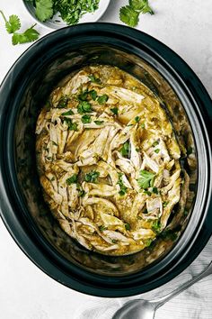 an overhead view of some food in a crock pot