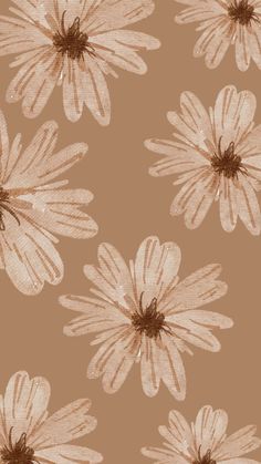 a brown and white flower pattern on a tan background