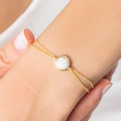 14K Gold Plated Sterling Silver Opal Bracelet is handcrafted with love and care by the finest artists. Minimalist Opal Bracelet made from 14K Gold Plate adjustable chain, high quality solid sterling silver and natural opal stone. Dainty 14K Gold Opal Bracelet is always a great gift idea for you and your loved ones.  This astonishing 14K Gold Plated Sterling Silver Opal Bracelet jewelry is the perfect match for your outfit. * Material: High Quality Solid 925 Sterling Silver * Finish: Sterling Silver ∙ 14K Gold * Chain: Adjustable * Gemstone: High Quality Opal Stone PACKAGING INFORMATION * All products are nicely packaged ready to gift in elegant jewelry boxes. TURN AROUND TIME * This design is ready to ship in 1 - 2 business days. If you can't find the information you need or need some advi Dainty Gold-plated Gemstone Bracelets, Adjustable Gold Bracelet With Gemstone, Minimalist Gold Chain Bracelet With Gemstone, Minimalist Gold Bracelet With Gemstone, Minimalist Gold Bracelets With Gemstones, Minimalist Yellow Gold Bracelet As Gift For Her, Yellow Gold Birthstone Chain Bracelet, Minimalist Yellow Gold Bracelet Gift For Her, Minimalist Yellow Gold Birthstone Bracelets