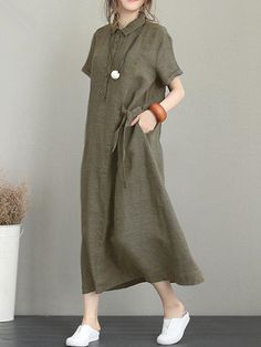 Sku CY-!84424 Material Cotton-blend , 70%Cotton Style Loose , Short Sleeves Feature Frenum , Solid Color Neckline Lapel Occasion Casual , Simple Seasons Summer Type Midi Dresses Color DEEP GRAY,ARMY GREEN,BLACK Size S,M,L,XL,2XL,3XL,4XL,5XL Please consult the size chart we provide for this item's measurements to help you decide which size to buy.Please note: There may be 1-3cm differ due to manual measurement. CMINCH Bust Shoulder Sleeve Length S 96 43 17 120 M 101 44 18 122 L 106 46 19 124 XL 1 Casual Khaki Midi Length Dress, Casual Khaki Dresses With Pockets, Casual Dark Green Short Sleeve Dress, Casual Olive Cotton Dress, Casual Green Dress For Work, Casual Green Dresses For Work, Casual Olive Dress For Daywear, Casual Olive Knee-length Dress, Long Casual Dresses