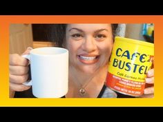 a woman holding a coffee mug in her right hand and smiling at the camera with an orange frame around her