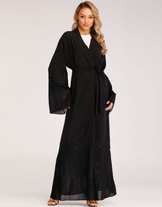 This casual polyester abaya is a stylish and comfortable option for everyday wear. It is made of soft and breathable polyester, making it perfect for hot and humid weather. The abaya has a loose-fitting design that allows for freedom of movement, and it is decorated with hollow out for a touch of style. Processing Time : 20-25 Business Days Made of soft and breathable polyester Loose-fitting design for comfort and freedom of movement Decorated with hollow out for a touch of style Machine-washabl Long Black Abaya For Spring, Black Long Abaya For Spring, Casual Solid Color Abaya For Spring, Casual Solid Abaya For Spring, Casual Abaya For Spring, Spring Black Maxi Length Abaya, Spring Black Long Abaya, Long Black Spring Abaya, Black V-neck Abaya For Eid